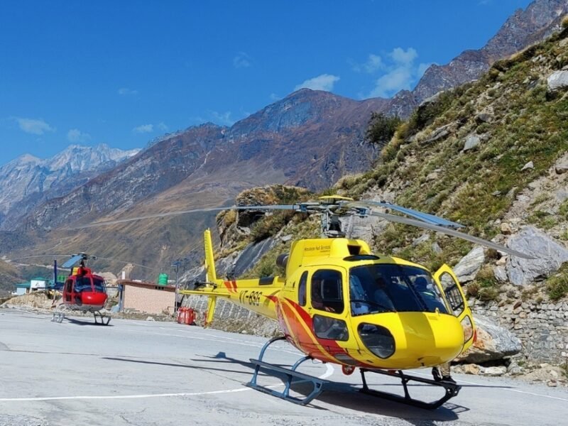 Helicopters prepared for departure on high mountain tarmac