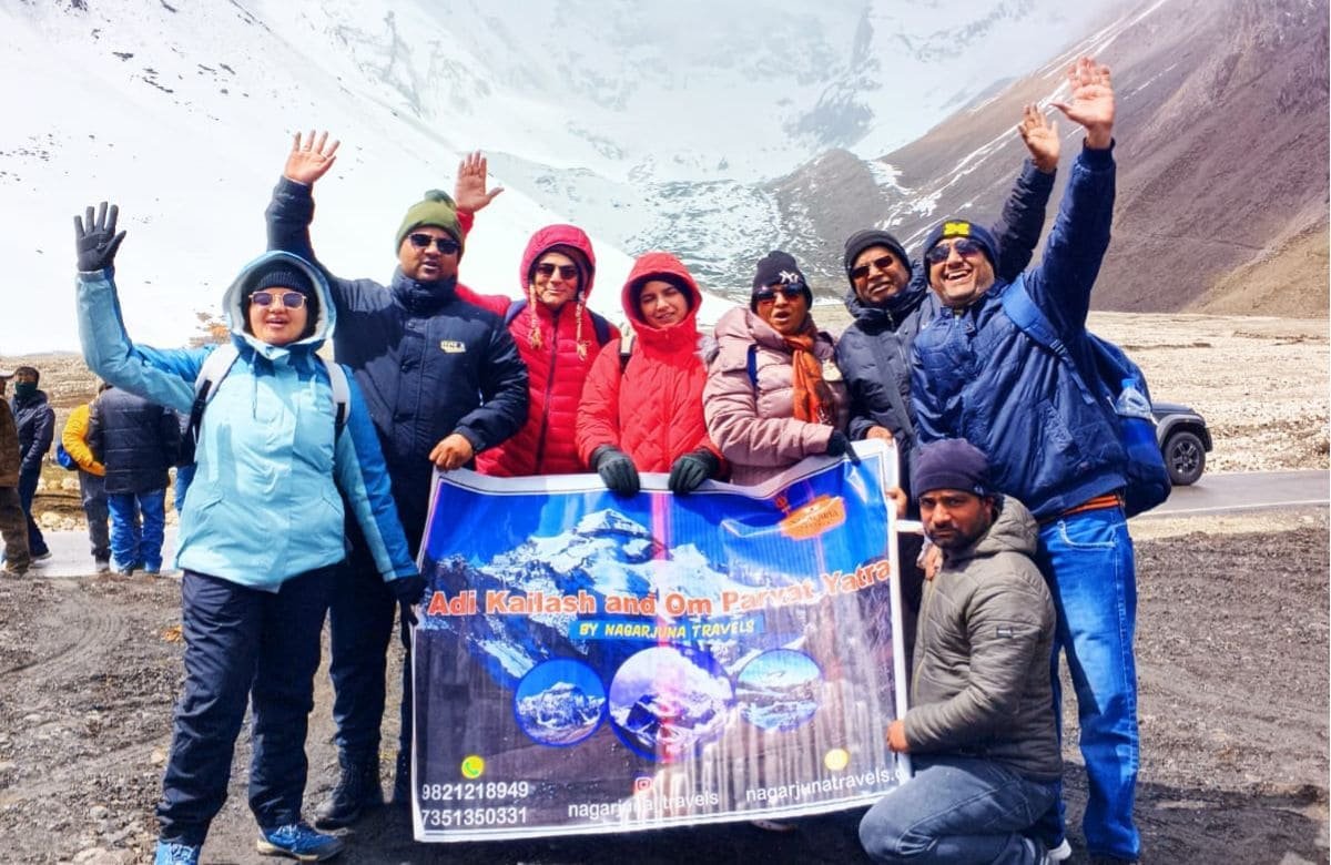Pilgrims visiting Adi Kailash and Om Parvat during the 2026 yatra season amidst the snow-capped Himalayan mountains in Pithoragarh, Uttarakhand.